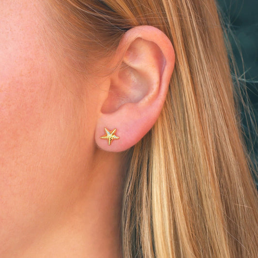 Kris Nations - Gold starfish stud earrings